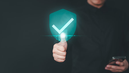 Certificate warranty approval or secure access system concept. User showing on hand identity proof icon for security protection system on virtual screen. Quality assurance of business service.の写真素材