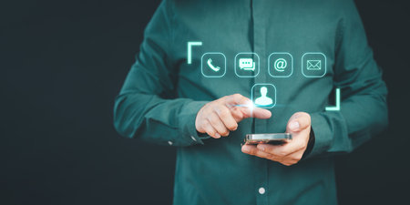 Man touch on the virtual screen member contact icons ( phone, email, address, live chat). Customer service, helpdesk advice online support. Contact us or Customer support hotline, people connect.の写真素材