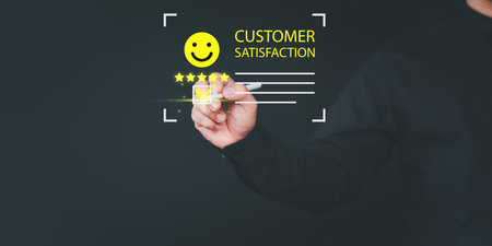 Customer give the point with a smile face icon to give satisfaction in opinion on virtual screen online application. User satisfaction survey, service experience rating, testimonial, feedback, review.の写真素材