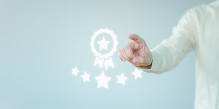 Male hand touch virtual screen on the best quality assurance with the star warranty icon. Assessment assurance of business service, guarantee, warranty, standard, certification, testimonial concept.の写真素材
