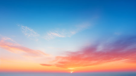 Abstract gradient sunrise in the sky with cloud and blue mix orange natural background.の素材