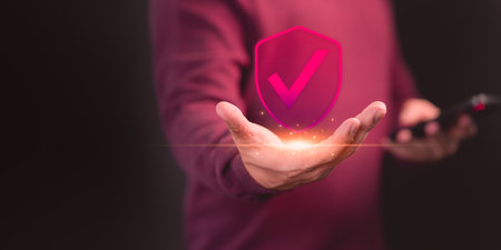 User is showing on hand identity proofing icon for security protection system on virtual screen. Quality assurance of business service. Certified guarantee approval or secure access system concept.の写真素材