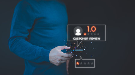 Customer review and feedback with one star on virtual screen. Assessment testimonial review for dislike service and low quality. Business concept of customer experience dissatisfied by smartphone.の写真素材