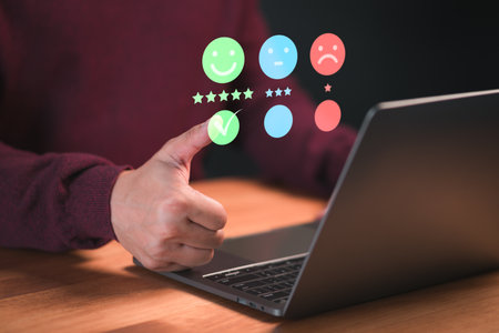 Customer touch virtual screen on smile face icon to give satisfaction in opinion and service. Customer satisfaction survey, service experience rating online application, testimonial feedback review.の写真素材