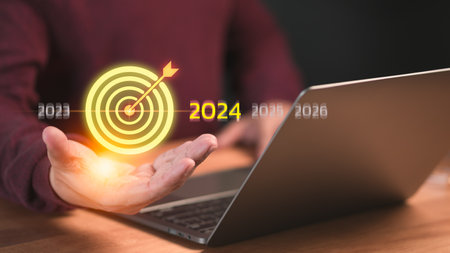 Male hand show the goal icon, Goal 2024 for working, success, savings money, good health, life balance, travel plan, learning in new business.の写真素材