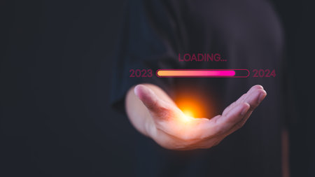 Male hand show the loading progress from 2023 to 2024 to countdown merry christmas and happy new year, working, success, savings money, good health, life balance, travel plan, learning new things.の写真素材