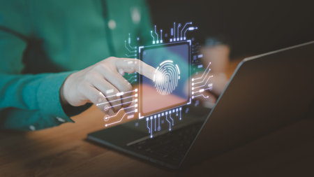 User man login or sign in with fingerprint scanning technology in the computer laptop. Secure...