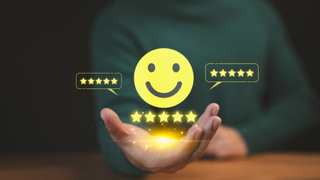 Best Excellent Services Rating. Customer show virtual screen on smile face icon with five stars. Business concept of testimonial customer service and feedback, good, the best of product and service.の写真素材