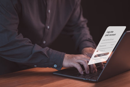 Person use a laptop computer type the username and password. User privacy security and protect personal data internet network. Cybersecurity and digital data protection technology concept.の写真素材
