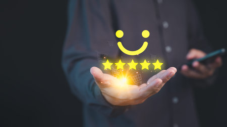 Person holding a glowing five-star customer review with a smile face, symbolizing high-quality...