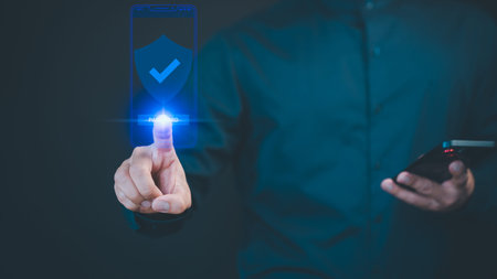 A person authenticates with a digital security interface on a smartphone, showcasing a virtual...