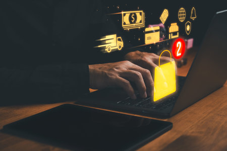 Customer using laptop computer with shopping bag icon, credit cards and 2 order. Business concept of...