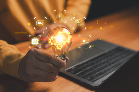 Artificial intelligence innovation concept with person holding light bulb, symbolizing AI technology, creative ideas, digital solution, machine learning, future innovation, smart business strategy.の写真素材