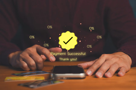 Close-up of hands using smartphone for online payment with digital confirmation message...