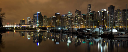 Vancouver BC Canada Skyline and Marina along False Creek at Night Panoramaの写真素材