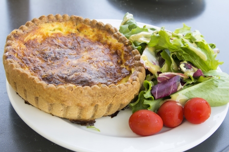 Quiche Lorraine Pasty with Mixed Green and Tomatoes Saladの写真素材