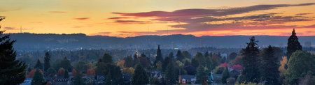 Golden Sunset Over Portland Oregon Cityscape with View of West Hills Panoramaの写真素材