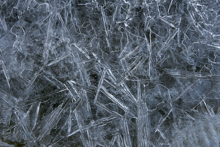 Frozen Pond with Crystals Water Icicles Pattern Formation Closeup Macroの写真素材