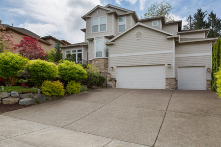 House in North American suburban residential neighborhood two storey with 3 car garage