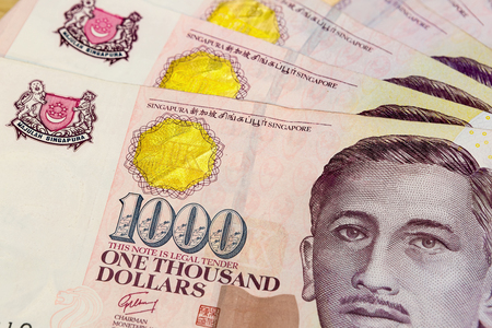 Singapore currency one thousand dollars bill notes closeup macroの写真素材