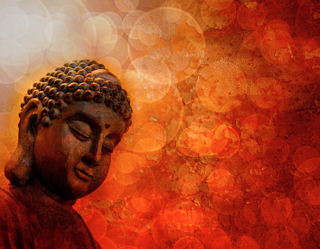 Bronze Zen Buddha Statue Meditating Light Rays Blurred Grunge Textured Red Backgroundの写真素材