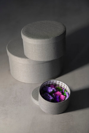 Different sized round boxes with beautiful flowers