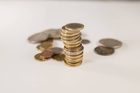A pile coin on a whiteの写真素材