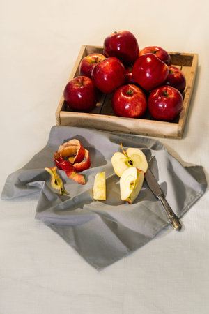 Tempting sliced apple and knife on a napkin