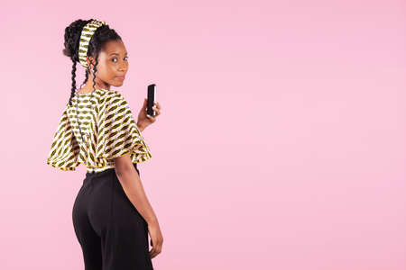 Afro american woman looking back at the cameraの写真素材