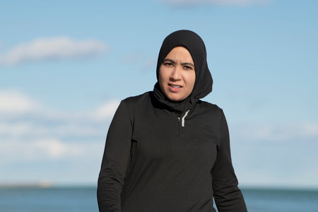 Close up of muslim woman wearing hijab and sportswear