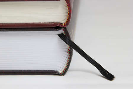 Two books profile with bookmarksの写真素材
