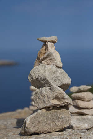 Five small stones forming a mountain handmadeの写真素材