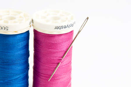 Two isolated cotton reels on a white backgroundの写真素材