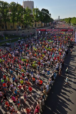 Riga, Latvia - May 19 2019: Riga TET marathon runners running from start lineのeditorial素材