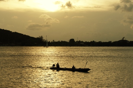 boat on sea sunsetの写真素材