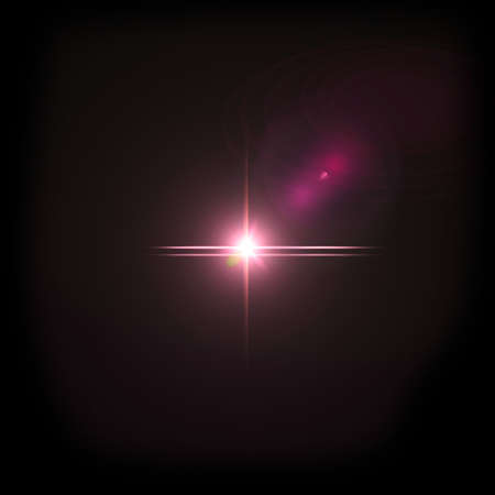 Lens flare with bright light isolated with a black background.の写真素材