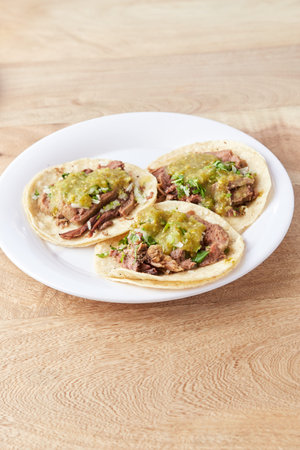 Mexican taco with salsa, taco al pastor