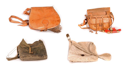 Four old hunting bags