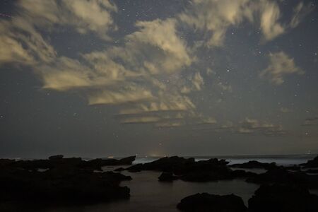Beautiful starry sky seen from the island (photographed at a famous astronomical observation spot in Kanagawa)の写真素材