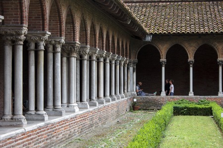 The cloister of the Church of the Jacobins in Toulouse, France. A southern gothic brick building.の写真素材