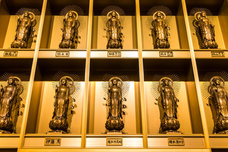 Golden standing statues of Buddha inside Ushiku Daibutsu, Ibaraki prefecture, Japanのeditorial素材