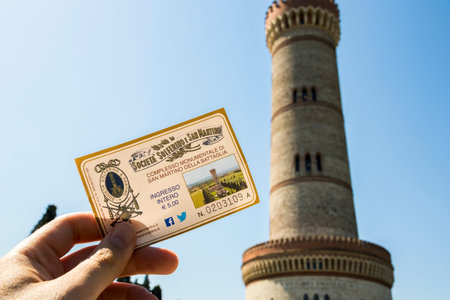 Left hand showing a ticket entrance for the Torre di San Martino della Battaglia, with the tower in...