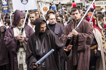 People disguised in Star Wars costumes for the III Imperial Stormtroopers parade 2017 in the Old City of Santiago de Compostela, Spainのeditorial素材