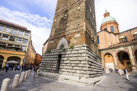 The base of the leaning tower of Garisenda in Bologna, Italy.のeditorial素材