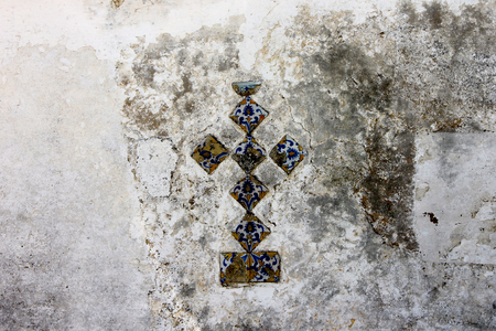 A Christian cross made of azulejo, a kind of glazed coloured tile traditionally used in Spanish and Portuguese buildingsのeditorial素材
