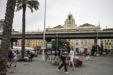 The Palazzo San Giorgio or Palace of St. George near the strada sopraelevata. Port of Genoa, Italyのeditorial素材