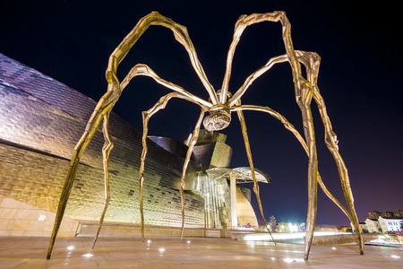 Maman, a sculpture of a spider by Louise Bourgeois that rests in front of the Guggenheim Museum Bilbao, Spainのeditorial素材
