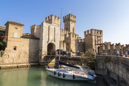The Castello Scaligero or Scaliger castle, a 13th century medieval port fortification near Lago di Garda in Sirmione, Lombardy, northern Italyのeditorial素材
