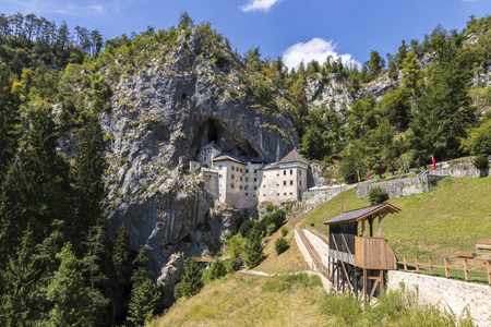 Predjama Castle (Predjamski grad), a Renaissance castle built within a cave mouth in the historical region of Inner Carniola, in south-central Sloveniaの写真素材