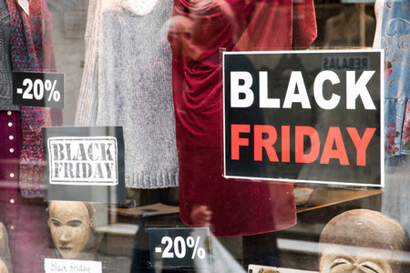 Seville, Spain. Store showcase during Black Friday, an informal name for the day following...
